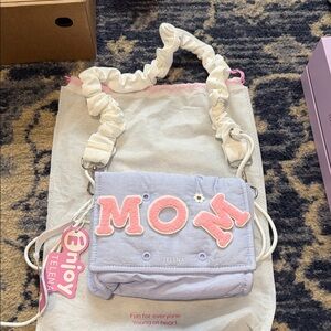 Telena Lavender Quilted 'MOM' Crossbody Bag with Pink Accents